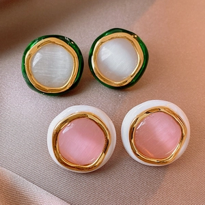 Elegant gold-plated cat eye stone earrings in forest green and creamy white styles