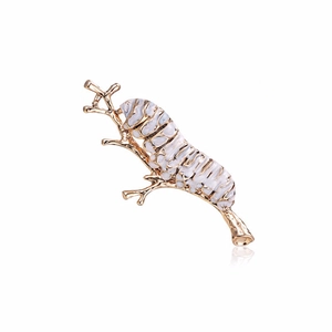 Elegant insect brooch featuring a white caterpillar on a golden branch design