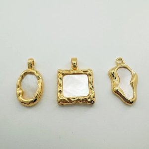 Detail of 18K gold-plated oval, square and irregular mother-of-pearl heart pendants