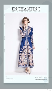 Detailed close-up of V-neckline and retro paisley print on deep blue maxi dress