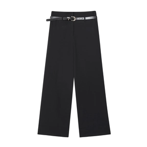 Women's black wide-leg trousers with thin metal buckle belt and folded hem on white background