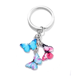 Silver alloy keychain with colorful enamel butterfly pendants in blue and pink tones
