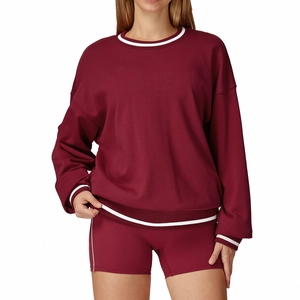 Women's burgundy long sleeve sweatshirt and shorts set with white contrast stripes