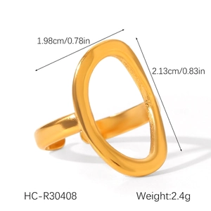 Detail view of irregular oval gold heart ring showing dimensions 1.98cm and 2.13cm