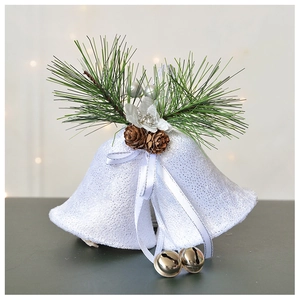 Close-up of velvet Christmas pendant with pine needles, cones and golden bells