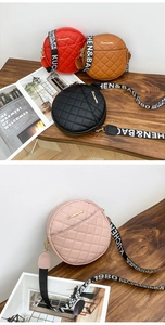 Close-up of quilted round crossbody bags with stylish wide printed straps in four colors