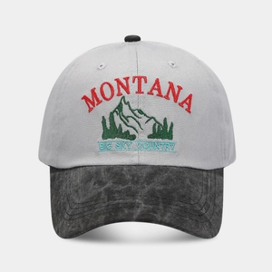 Detail view of the Montana mountain embroidery on this washed vintage baseball cap