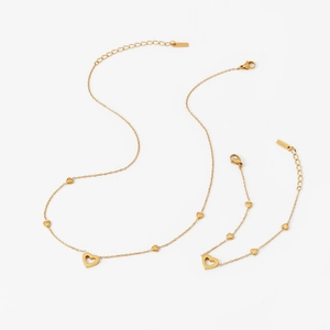 Elegant gold heart-shaped stainless steel necklace and bracelet jewelry set for women