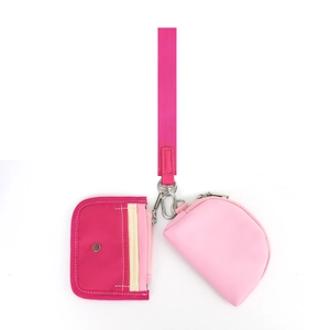 Pochette da polso rosa multifunzione con porta carte e mini borsellino su cinturino