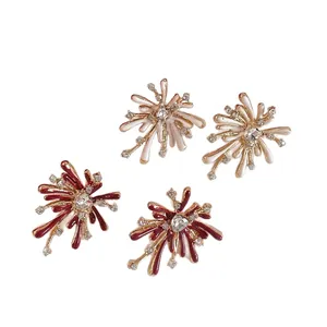 Elegant firework starburst stud earrings with red white enamel and sparkling crystals