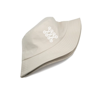Beige cotton twill bucket hat with white geometric logo print and reinforced stitching