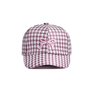 Pink and white houndstooth kids baseball cap with a decorative satin bow detail