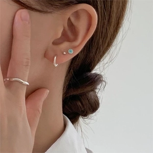 925 sterling silver set featuring smiley face studs, hoop earrings, and wavy open ring