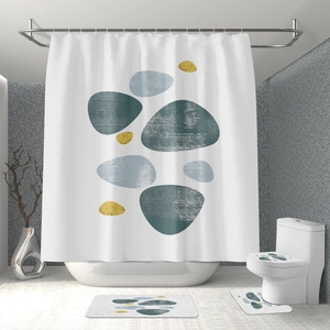 Modern bathroom set with pebble pattern shower curtain and three matching floor mats