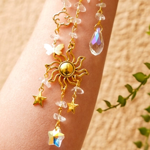 Golden sun catcher wind chime with natural crystal stones and star pendants for home decor