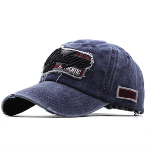 Vintage navy blue washed denim baseball cap with 3D embroidery and distressed details
