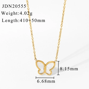 Macro detail of butterfly pendant necklace with dimensions and 14K gold specs