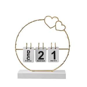 Creative golden iron flip calendar with double heart decor and LED light string