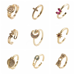 Set of nine golden open rings with micro-paved cubic zirconia in diverse fashion designs
