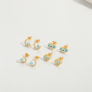 Set of 4 pairs of gold-plated evil eye and crescent moon stud earrings with blue enamel
