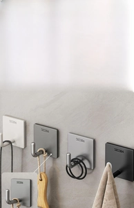 Detail showing SUS304 stainless steel adhesive hooks in black, grey, and silver finishes