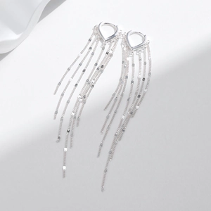 Elegant S925 sterling silver tassel drop earrings with heart-shaped clasps on white background