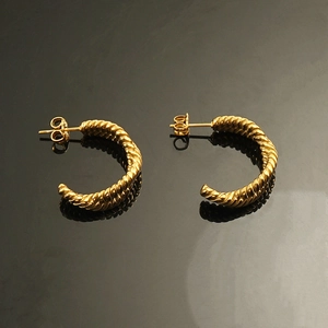 Polished 18K gold plated C-shaped twisted rope hoop earrings with a sleek reflection