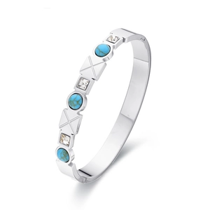 Silver stainless steel cuff bracelet with turquoise stones and geometric X patterns