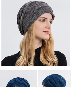 Detail of grid knit texture and leather logo patch on winter thermal beanie hat