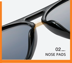 Nahaufnahme der goldenen Nasenpads und des schwarzen Rahmens dieser trendigen Sonnenbrille