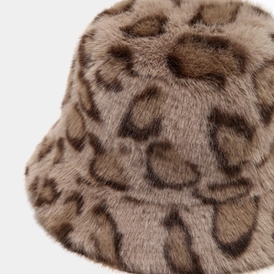 Close-up detail of plush leopard print faux fur bucket hat with soft texture
