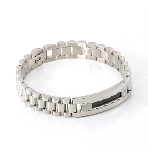 Detail of men's stainless steel watch-style link bracelet with black carbon fiber inserts