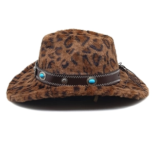 Detail of leopard print faux fur cowboy hat with turquoise beads and metal studs