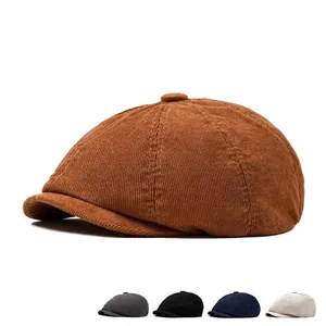 Retro corduroy newsboy cap for men and women available in brown, grey, black, and navy