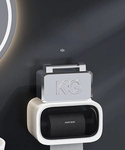 Detail showing high weight capacity of wall-mounted white toilet paper box with clear window
