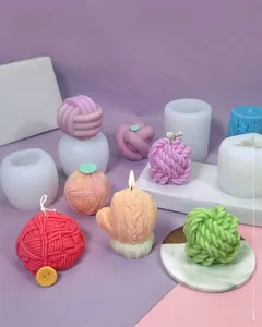 Macro view of silicone candle mold featuring intricate knitted yarn ball textures
