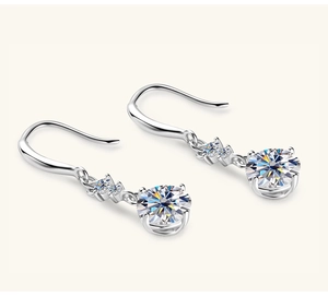 Detailed macro view of S925 silver drop earrings featuring brilliant moissanite stones