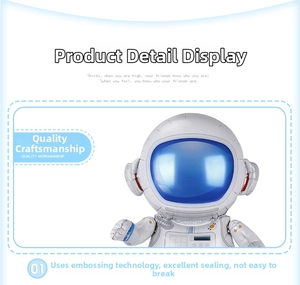 Detail view of astronaut foil balloon showing metallic silver finish and blue helmet visor