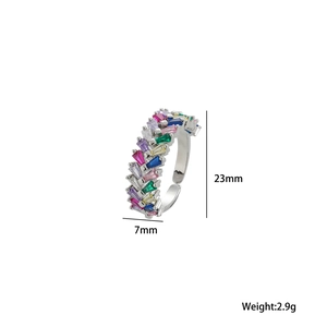 Detail view of adjustable silver ring featuring multi-colored rectangular zircon stones