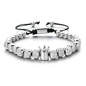 Vintage silver crown bead bracelet for men with adjustable black braided cord on white background