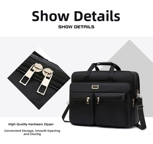 Detail of premium hardware zippers and multi-pocket storage on black oxford business bag