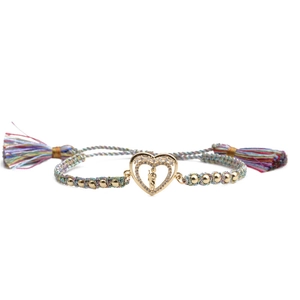 Close-up of woven adjustable heart bracelet with zircon inlay and colorful tassels