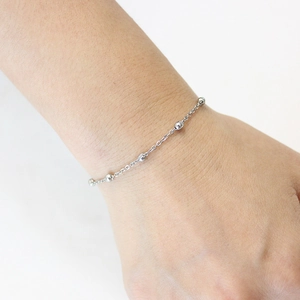 Minimalist silver beaded stainless steel chain bracelet for women on wrist