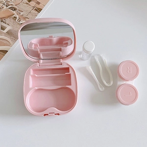 Roze contactlensdoosje set met spiegel, pincet en vloeistof flesje in strak design