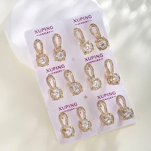 Elegant 6-pair gold plated earring set with round clear cubic zirconia on white card