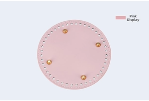 Pink round leather bag base with golden metal studs and pre-punched sewing holes