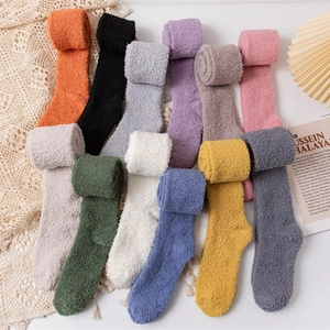 Thick coral fleece over-knee socks in 12 assorted colors for winter warmth and comfort