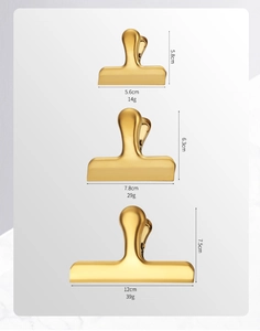 Three sizes of golden stainless steel food clips with precise dimensions and weights