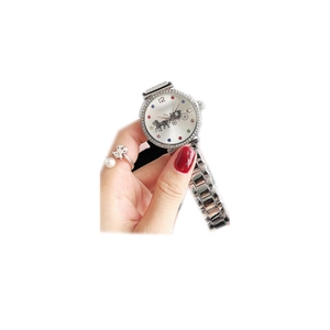 Elegant silver quartz watch with rhinestone bezel and matching pearl bear ring