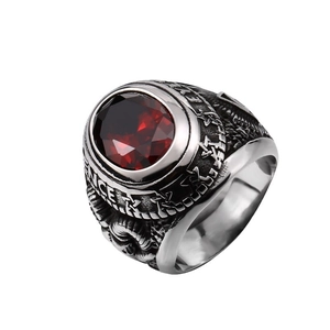 Vintage stainless steel masonic ring with large red zircon stone and intricate relief carving